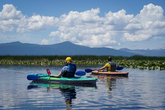 Two kayakers on Upper Klamath Basin on tour with Sky Lakes Wilderness Adventures