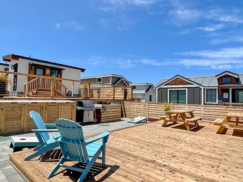 Expansive outdoor communal patio area and deck at Dillon Beach Resort in Marin 