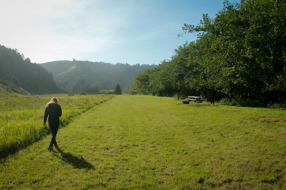 woman walking willow camp Sonoma Coast