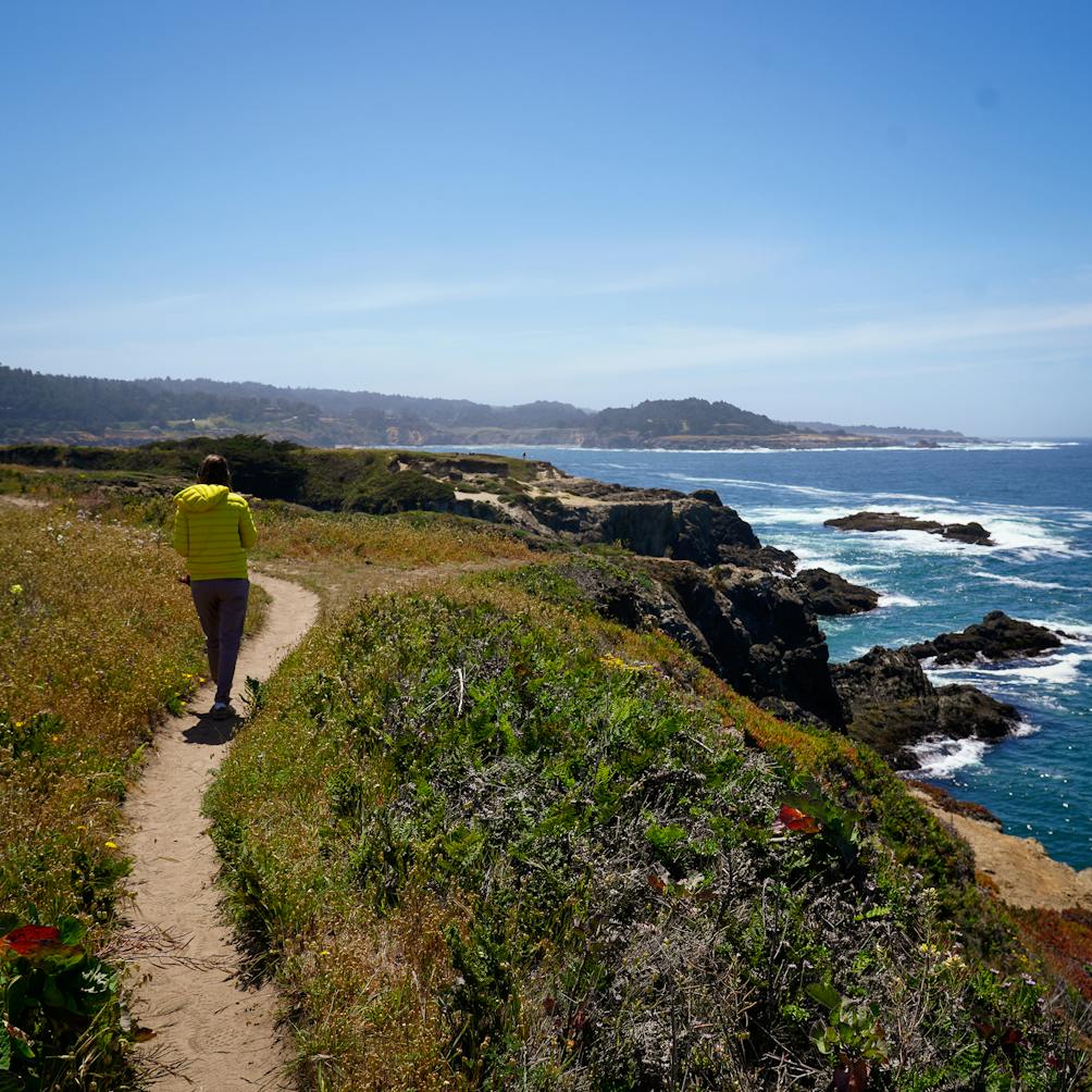 woman hiking at Mendocino Headlands State Park