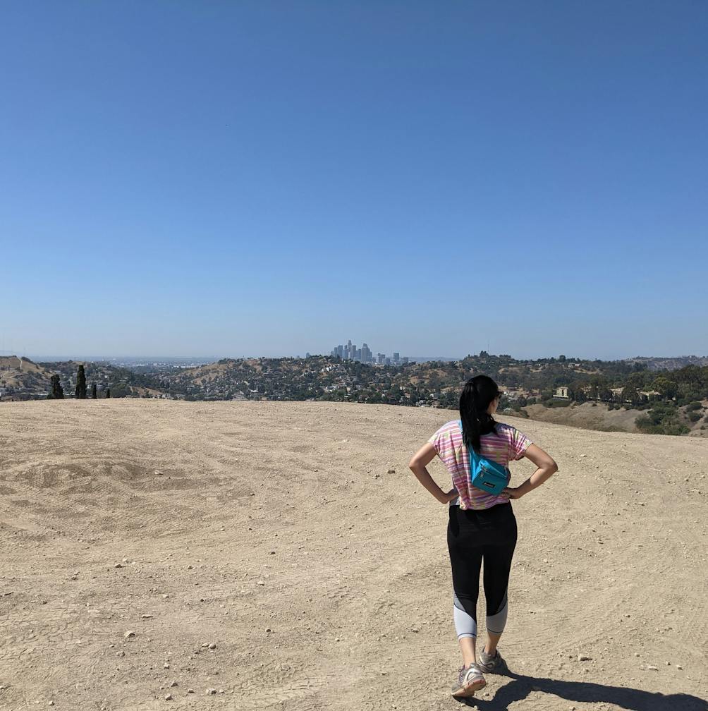 Hiker on a plateau at Elephant Hill Open Space in Los Angeles 