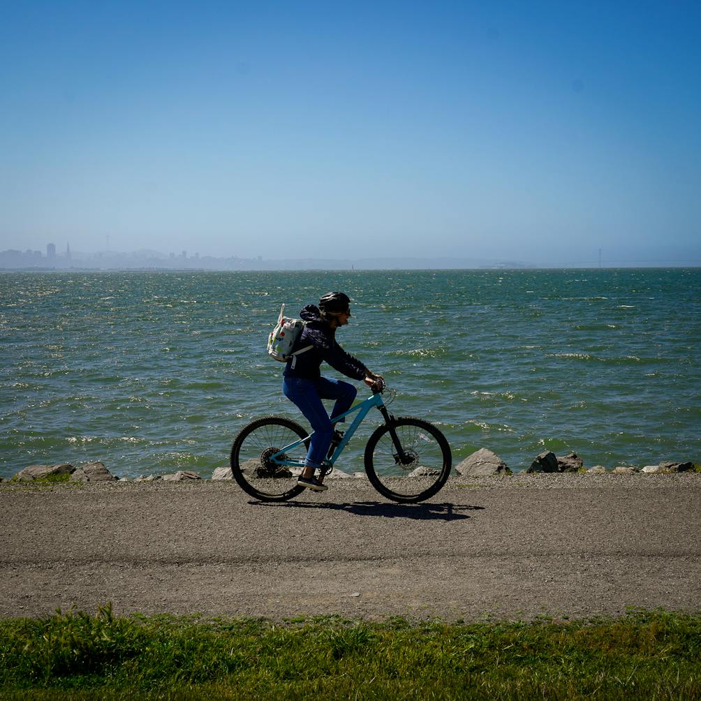 biker on a trail at Brickyard Cove in Berkeley 