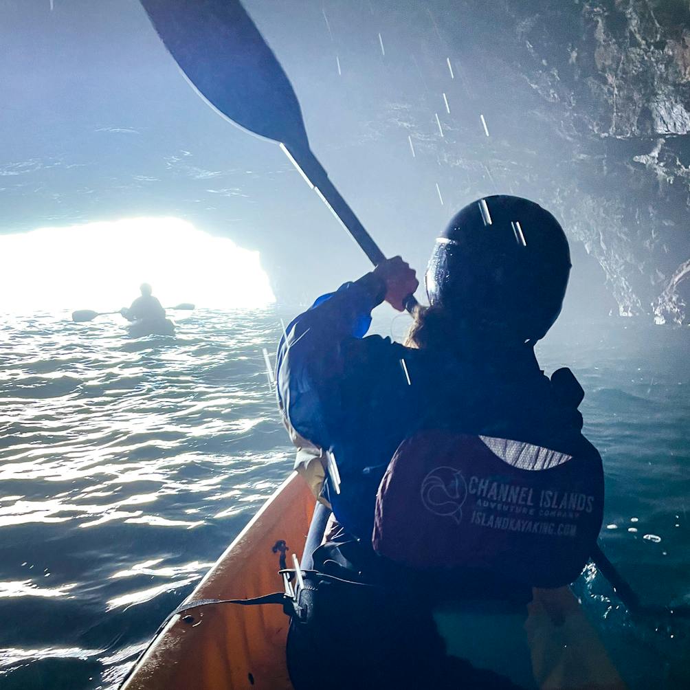 Kayaker inside cave at Channel Islands National Park Adventure Sea Cave Kayak Tour 