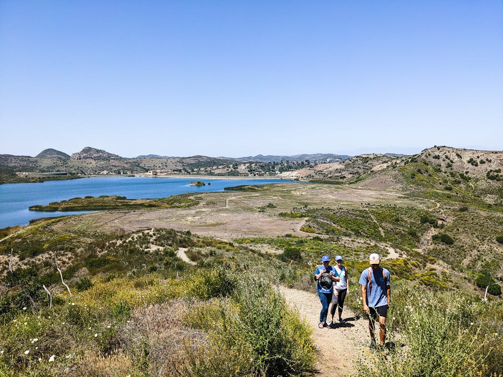 Hikers by the reservoir at Triunfo Creek Park near Thousand Oaks 