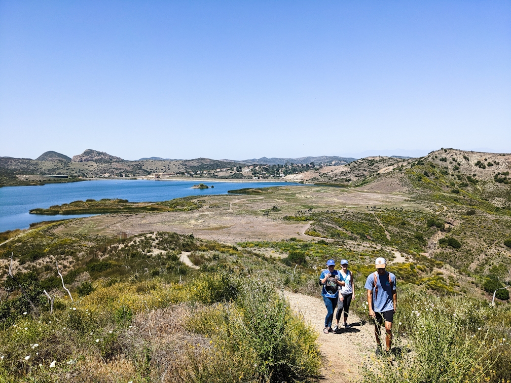 Hikers by the reservoir at Triunfo Creek Park near Thousand Oaks