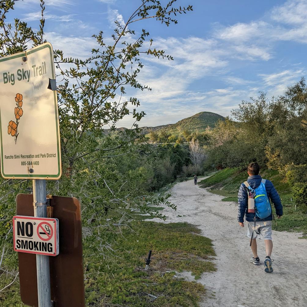 Hiker passing the sign for Big Sky Trail in Simi Valley Ventura County 