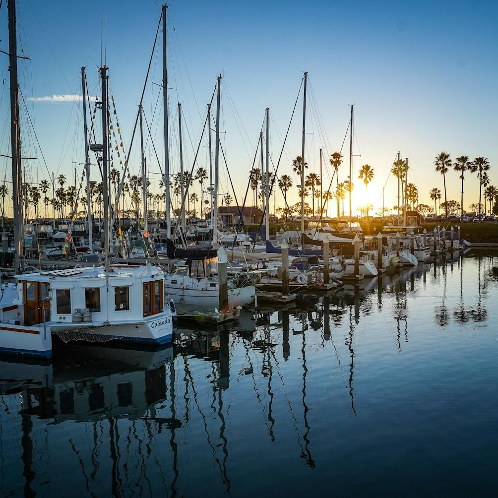 docked sailboats at sunset at Channel Islands Harbor