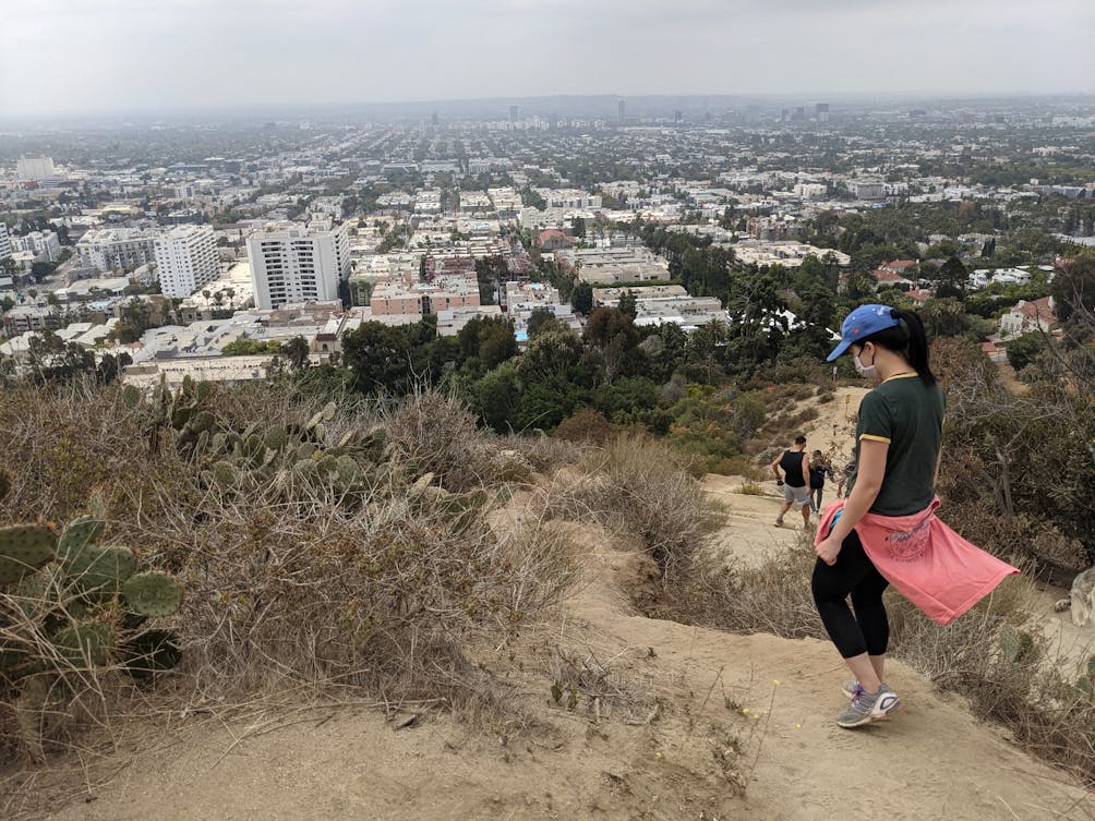 Hiker about to start down a trail at Runyon Canyon in Los Angeles 
