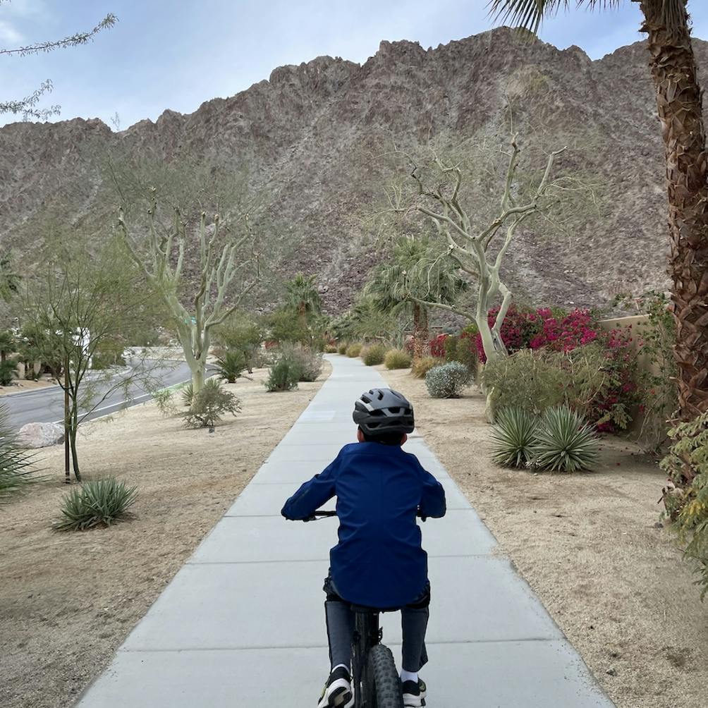 boy riding bike in La Quinta