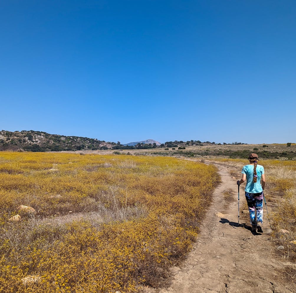 Hiker on a trail in Wright's Field in San Diego County near Alpine 