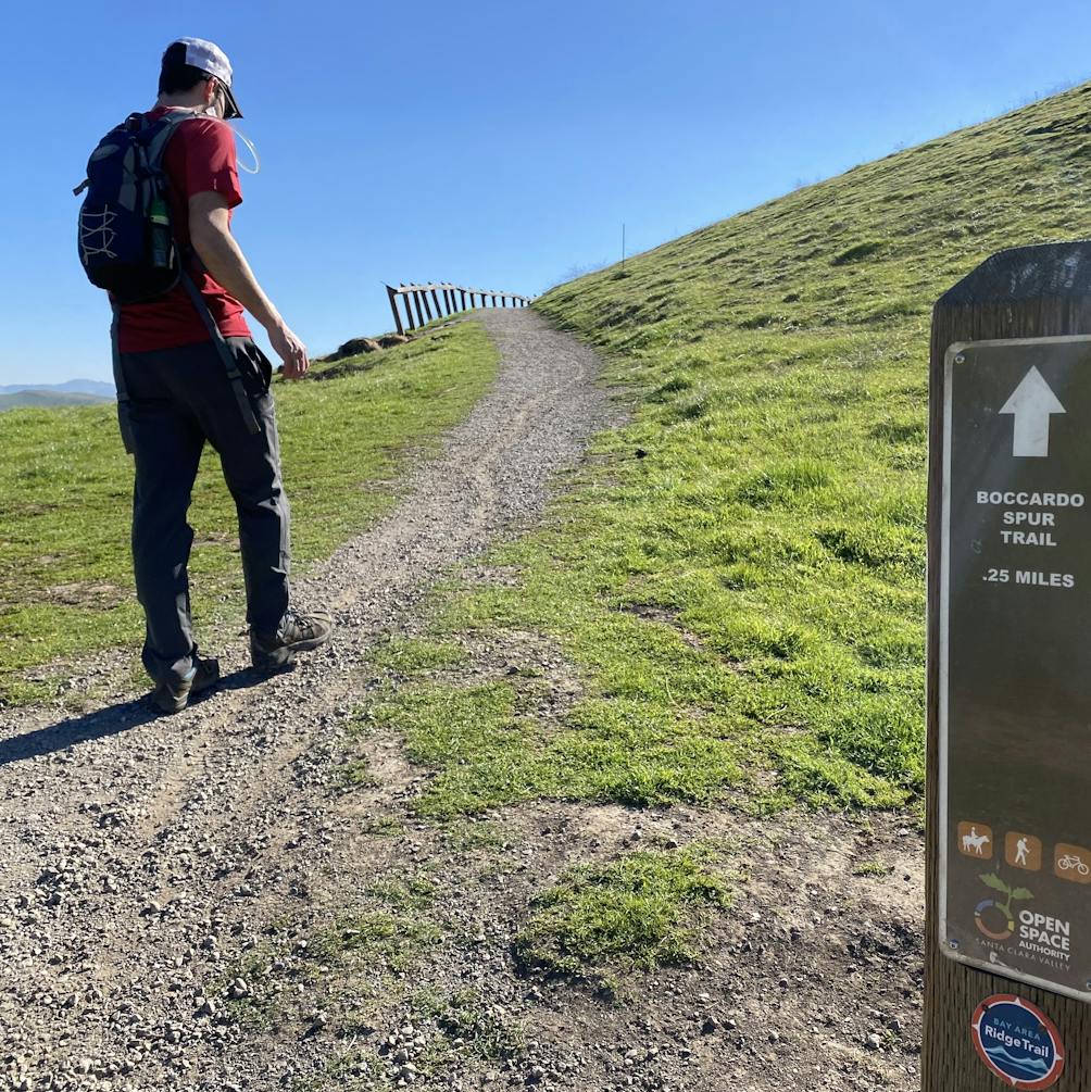 Hiker on a trail at Alum Rock Park in San Jose 