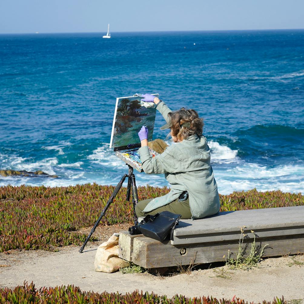 woman painting Monterey