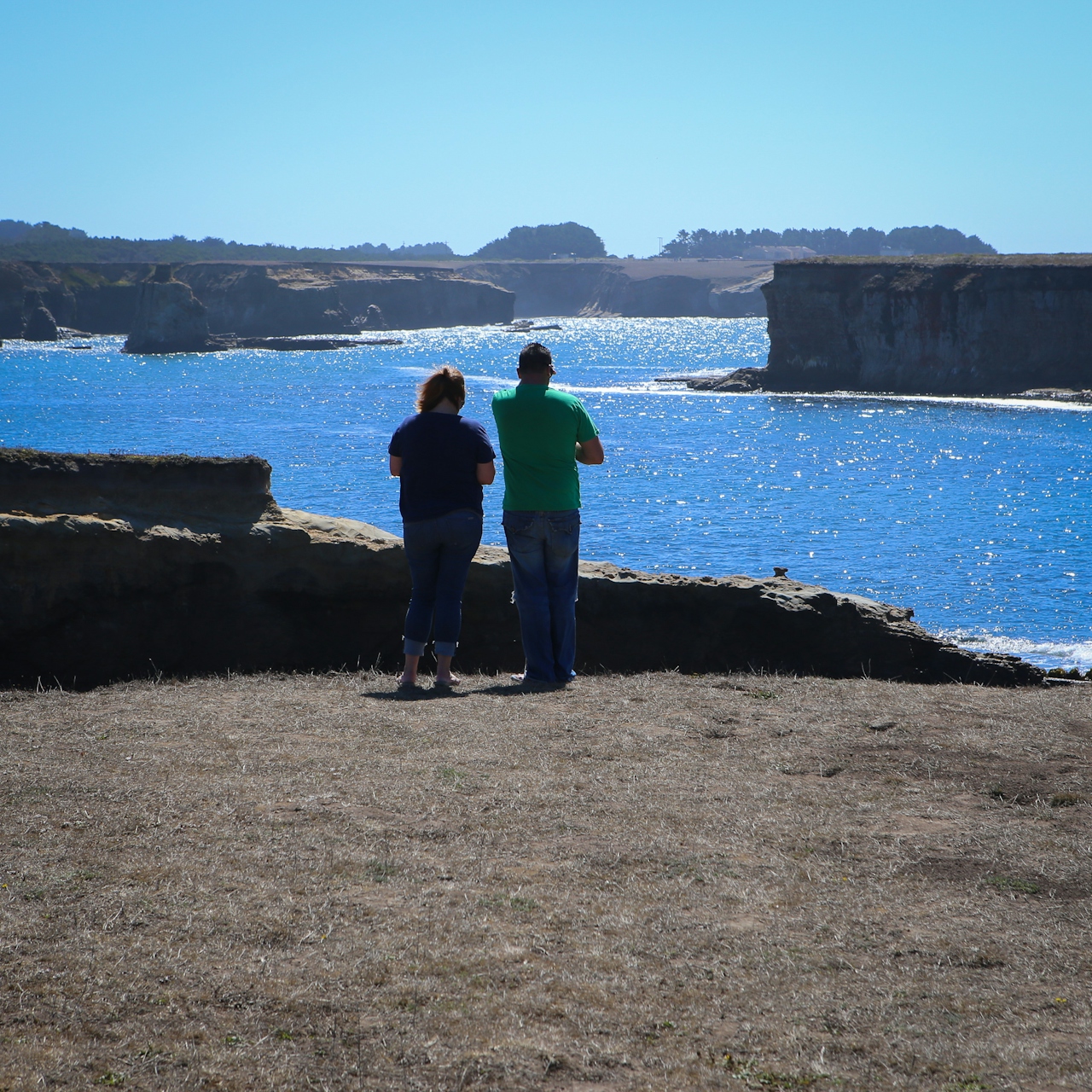 couple hiking Stornetta Public Land