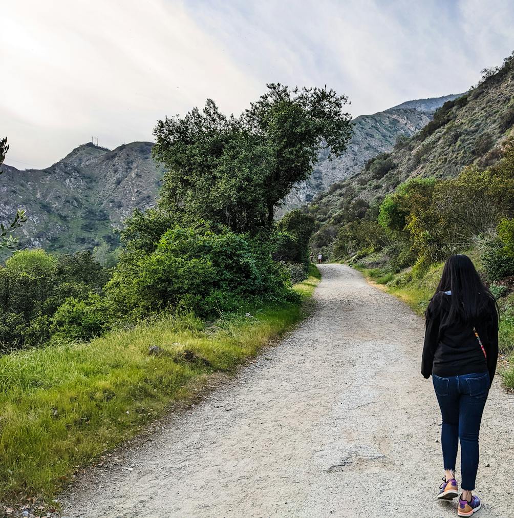 Hiker walking on a trail at Azusa River Wilderness Park in the San Gabriels 