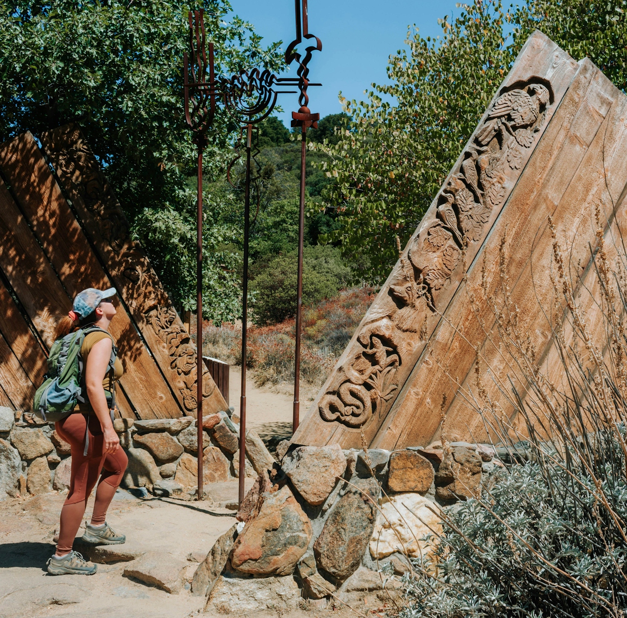 Hiker looking at the ruins of the Old Volcan Mountain Observatory Outpost near Julian San Diego County 