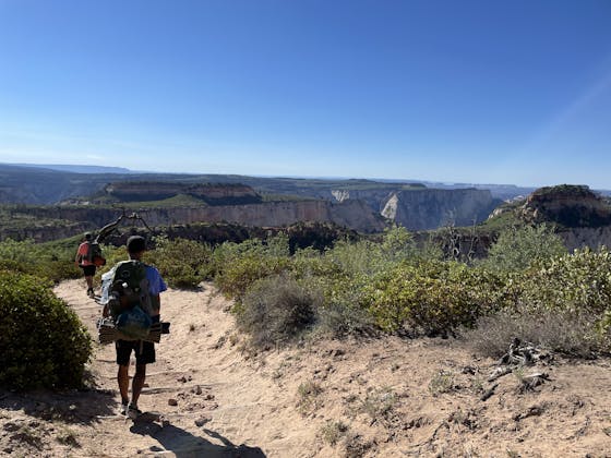 Backpackers on a trail in Zion National Park