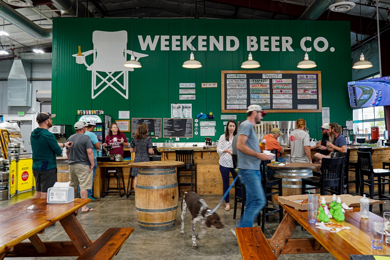 People wandering about near the picnic area of Weekend Beer Co. in Grants Pass Southern Oregon 