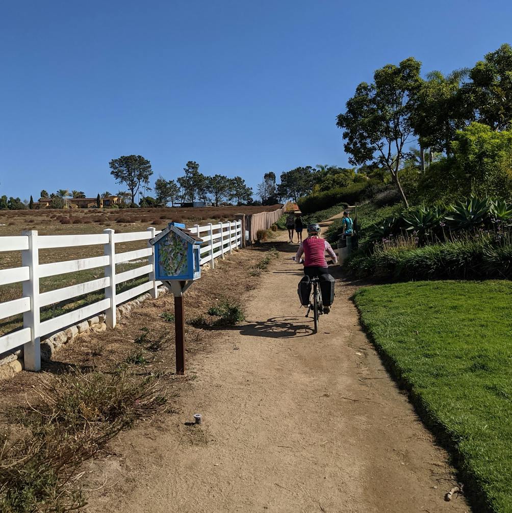 Person biking a trail at Encinitas Ranch in North San Diego County 