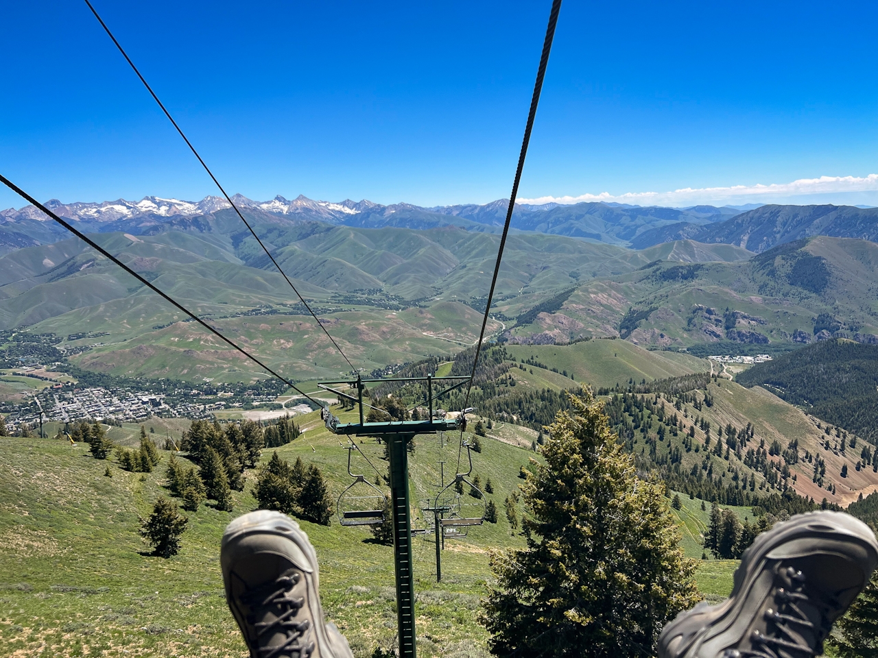 Two feet in picture of coming down a chairlift on Bald Mountain in Sun Valley Idaho during summer