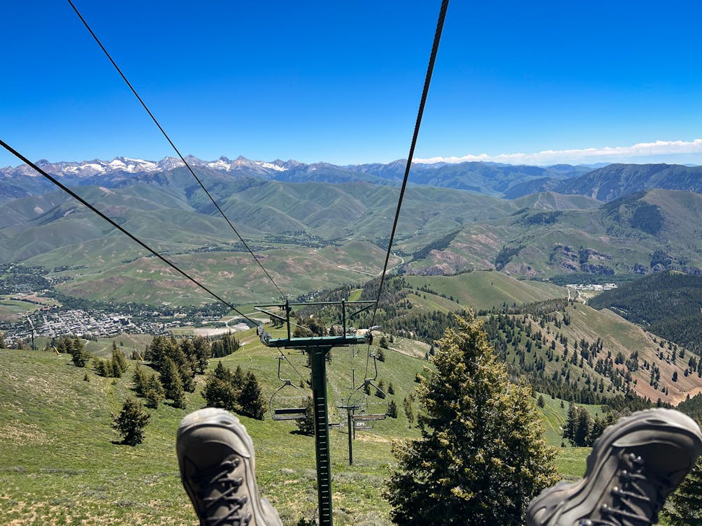 Two feet in picture of coming down a chairlift on Bald Mountain in Sun Valley Idaho during summer