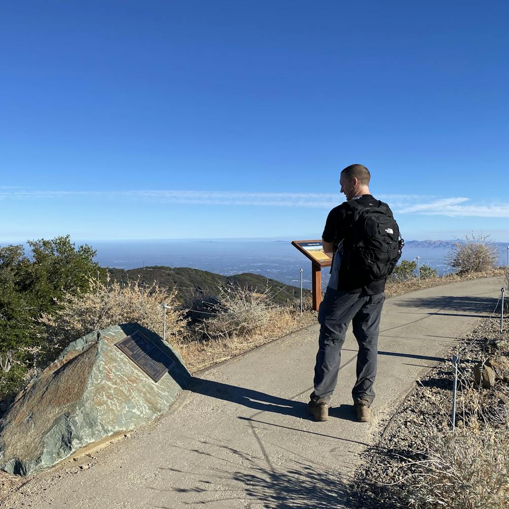 Hiker at the summit of Mount Umunhum in the South Bay 