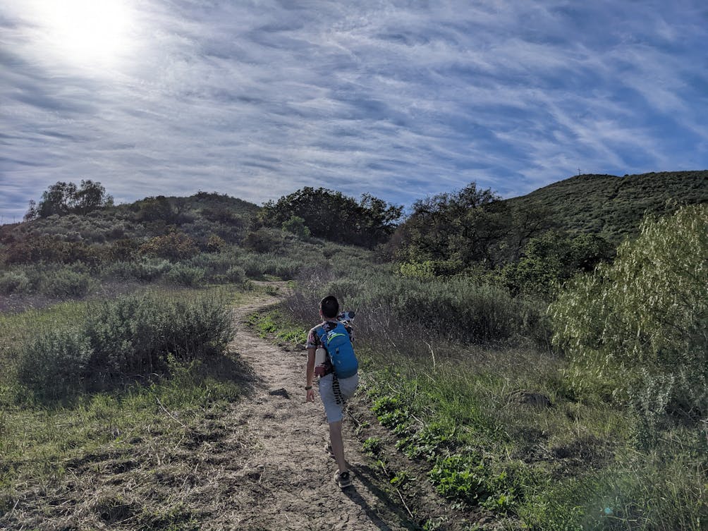 Hiker on a trail at Mount McCoy in Simi Valley 