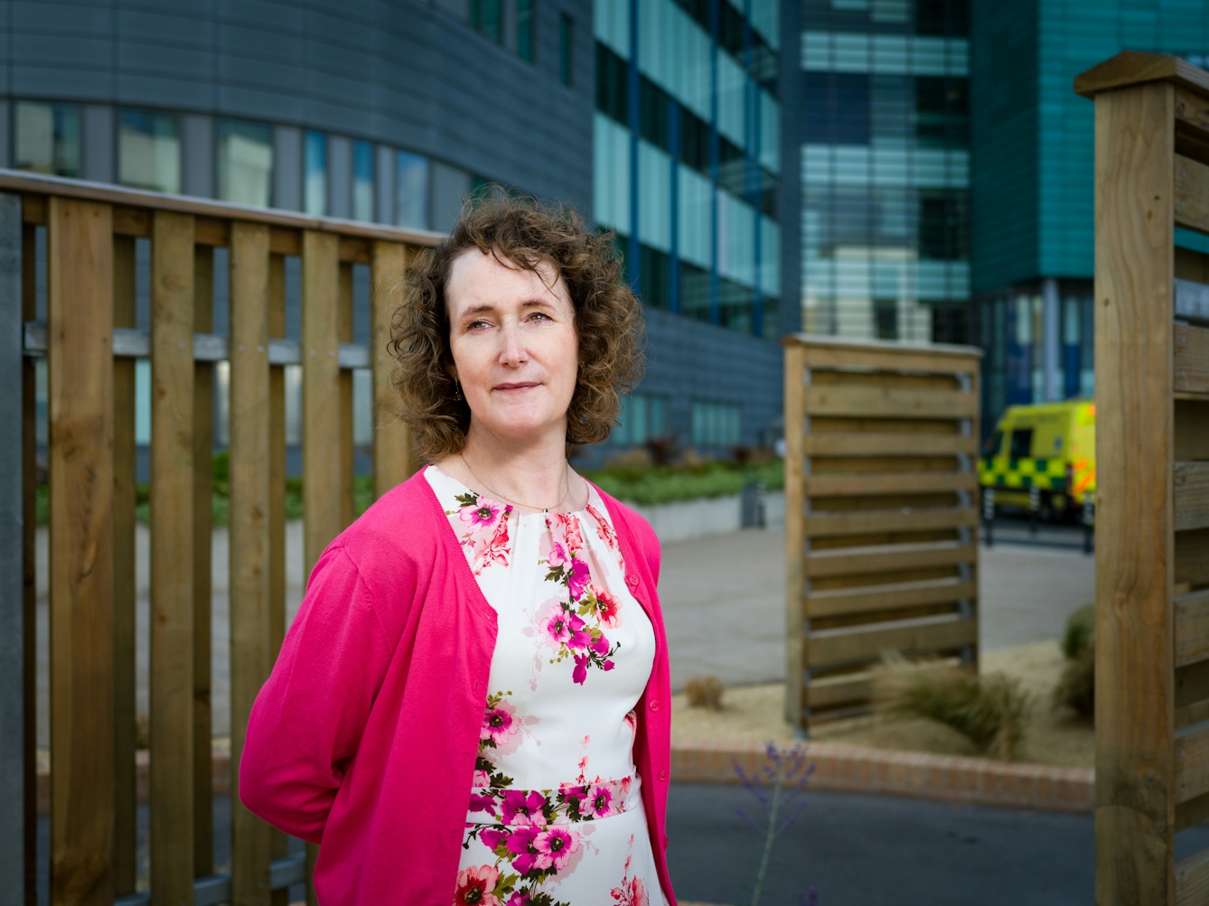 Photographic portrait of Heather Smith, consultant pharmacist, outside St James's University Hospital, Leeds.