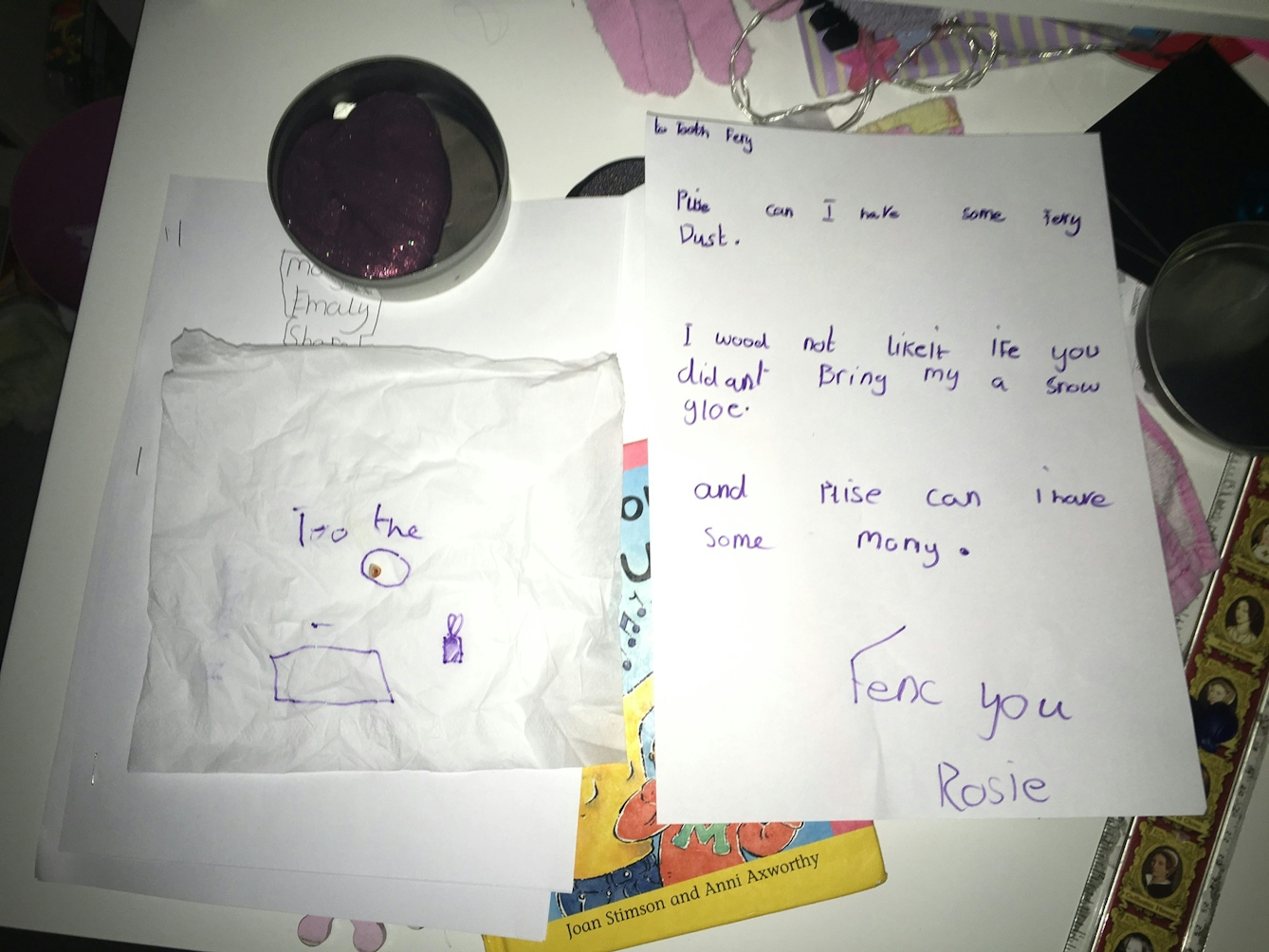 Letter written in mauve felt-tip on white paper. Reads: To Tooth Fairy. Please can I have some fairy dust. I would not like it if you didn't bring me a snow globe. And please can I have some money. Thank you, Rosie.
