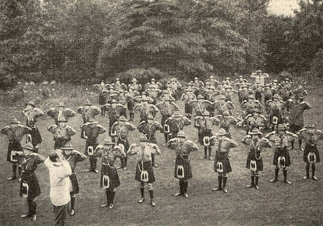 Boy scouts doing exercise drills