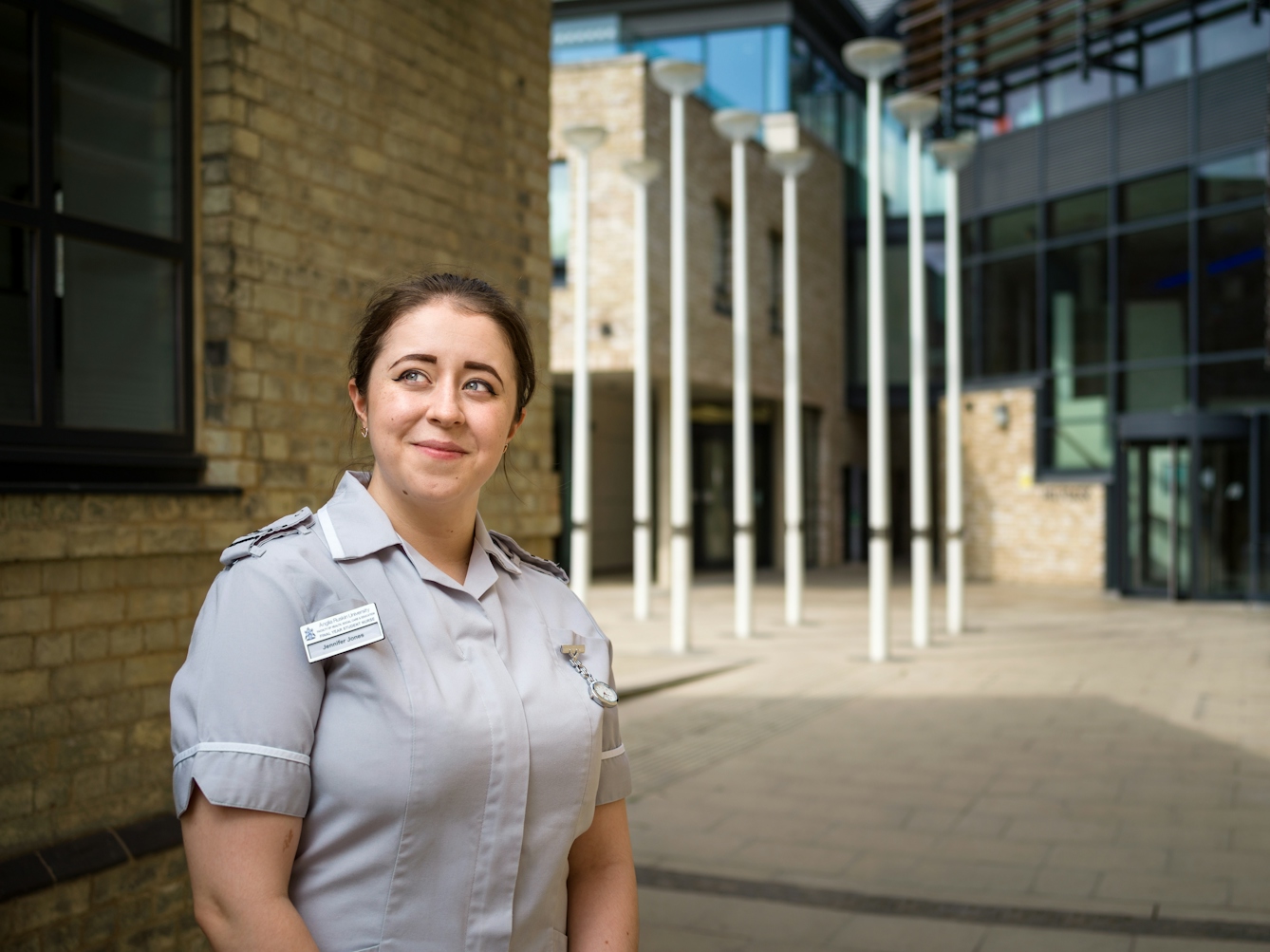 Photographic portrait of Jenny Jones, trainee nurse outside Anglia Ruskin University, Cambridge.