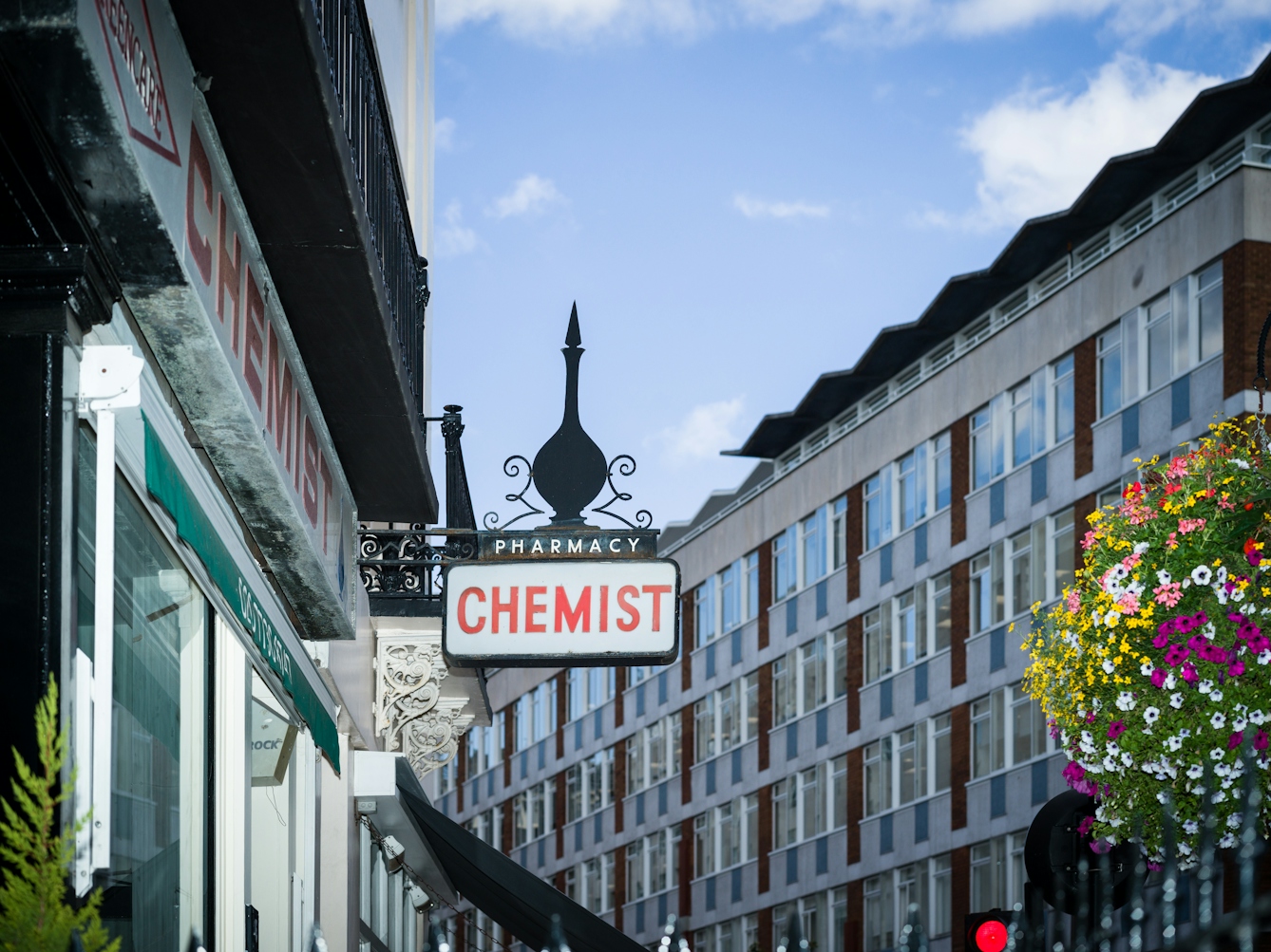 Chemist's sign featuring a traditional medicine jar