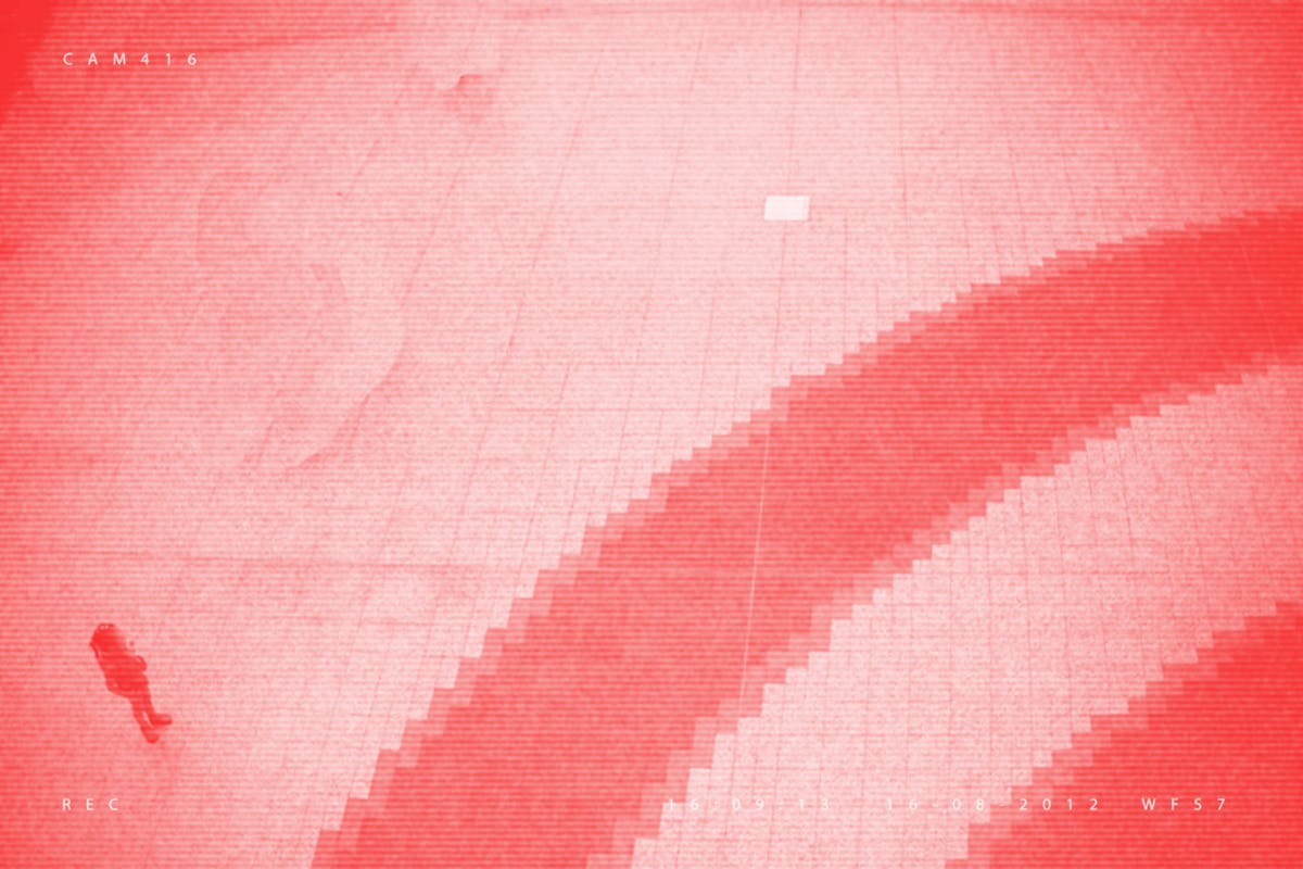 Pixellated photograph from a shopping mall security camera, where all adults have been crudely 'Photoshopped' out of the image, leaving one remaining child. The image has a red/pink tone applied to it.