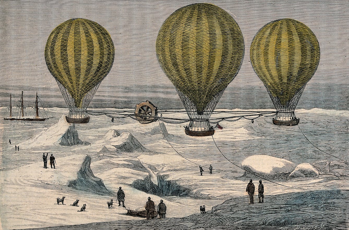 Coloured wood engraving showing people and dogs looking on as three hot-air balloons travel over a snowy landscape.