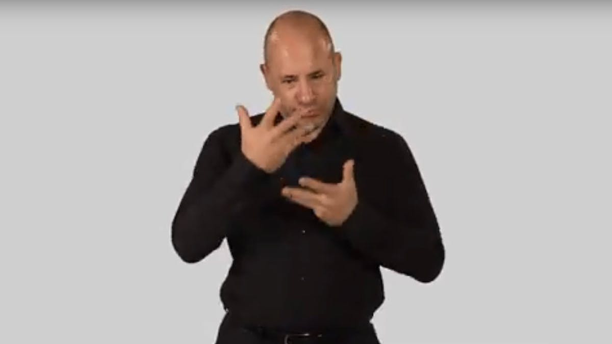 Man doing sign language