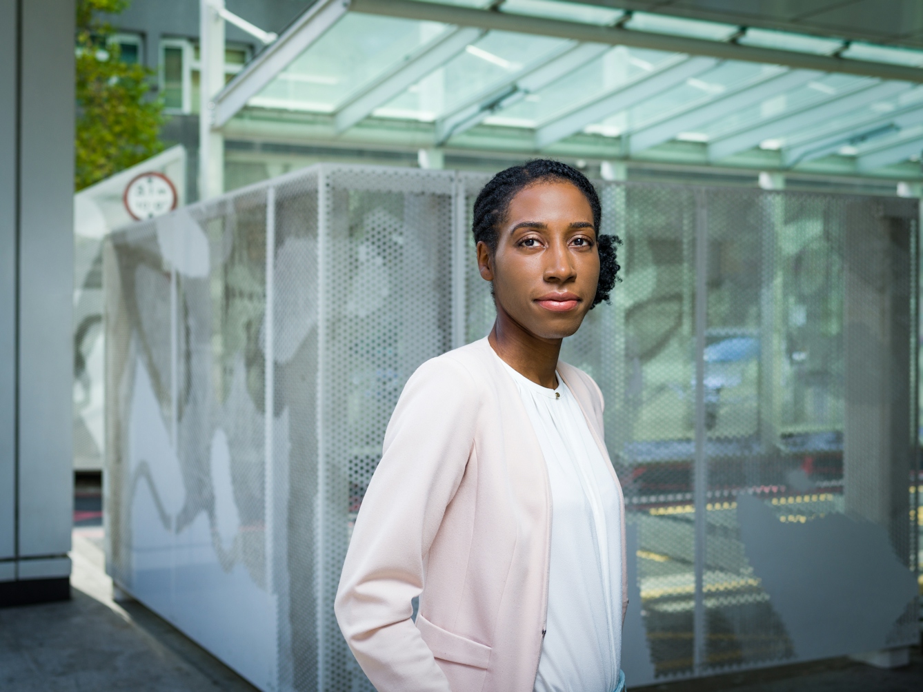 Photographic portrait of urological surgeon, Sarah Itam outside University College Hospital.