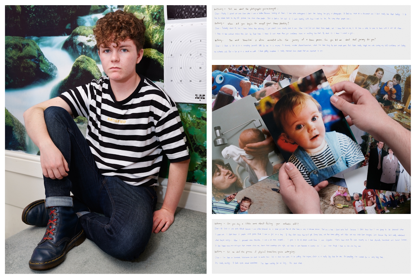 Photograph of an individual sat on the floor of a bedroom. They are looking straight to camera and behind them the wall is covered in waterfall wallpaper. To their left is a calendar hanging on the wall. To the right of this photograph is another photograph showing two hands holding a family photo of a young baby. Above and below this image are images of handwritten texts.