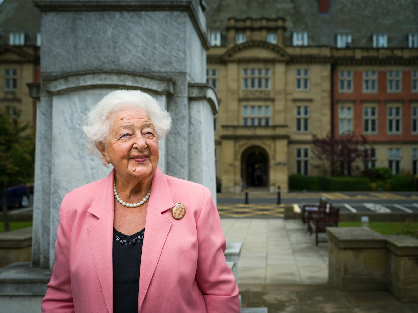 Photographic portrait of Ethel Armstrong outside the Royal Victoria Infirmary, Newcastle upon Tyne