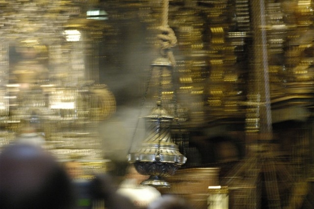 The incense burner in Santiago de Compostela, Spain is pictured in motion.