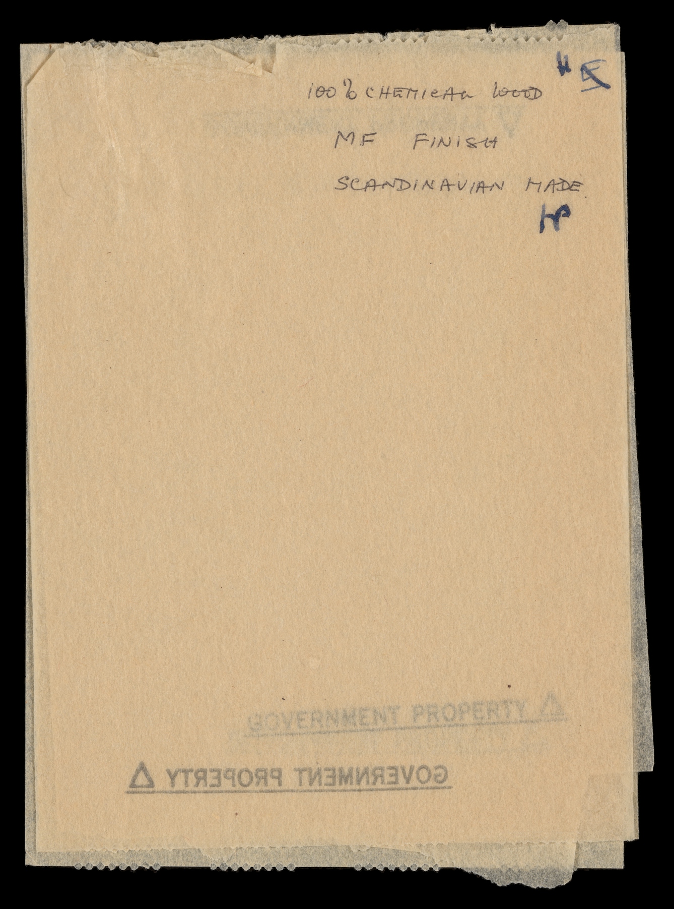 Photograph of a toilet paper sample sheet, bearing the hand written words "100% chemical wood, MG. Finish, Scandinavian made".
