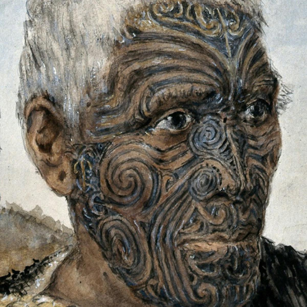 Image of man with white hair and facial tattoos