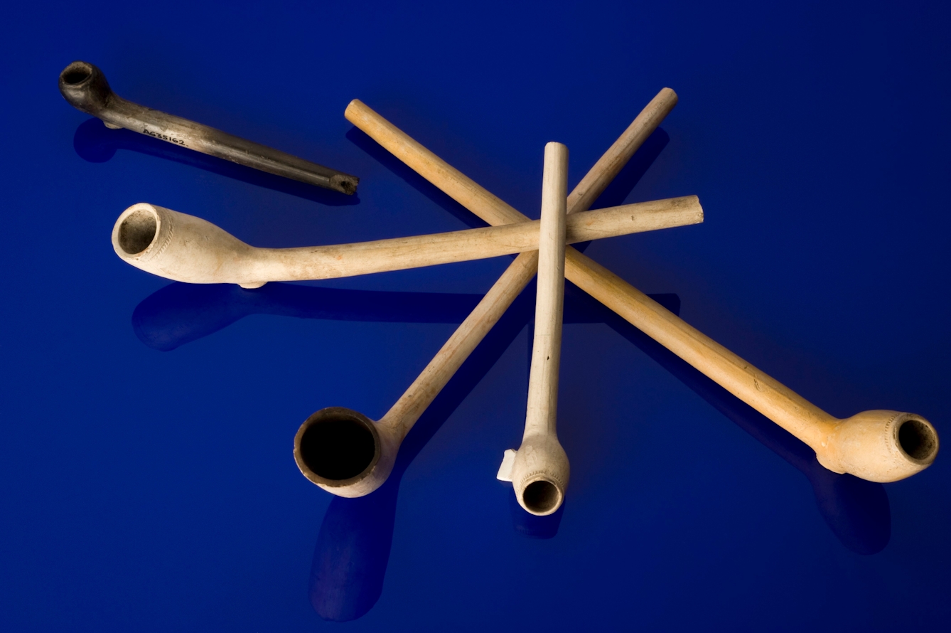 Five examples of simple, inexpensive clay tobacco pipes.