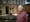Photographic portrait of a man in the courtyard at UCL Eastman Dental Institute, London.