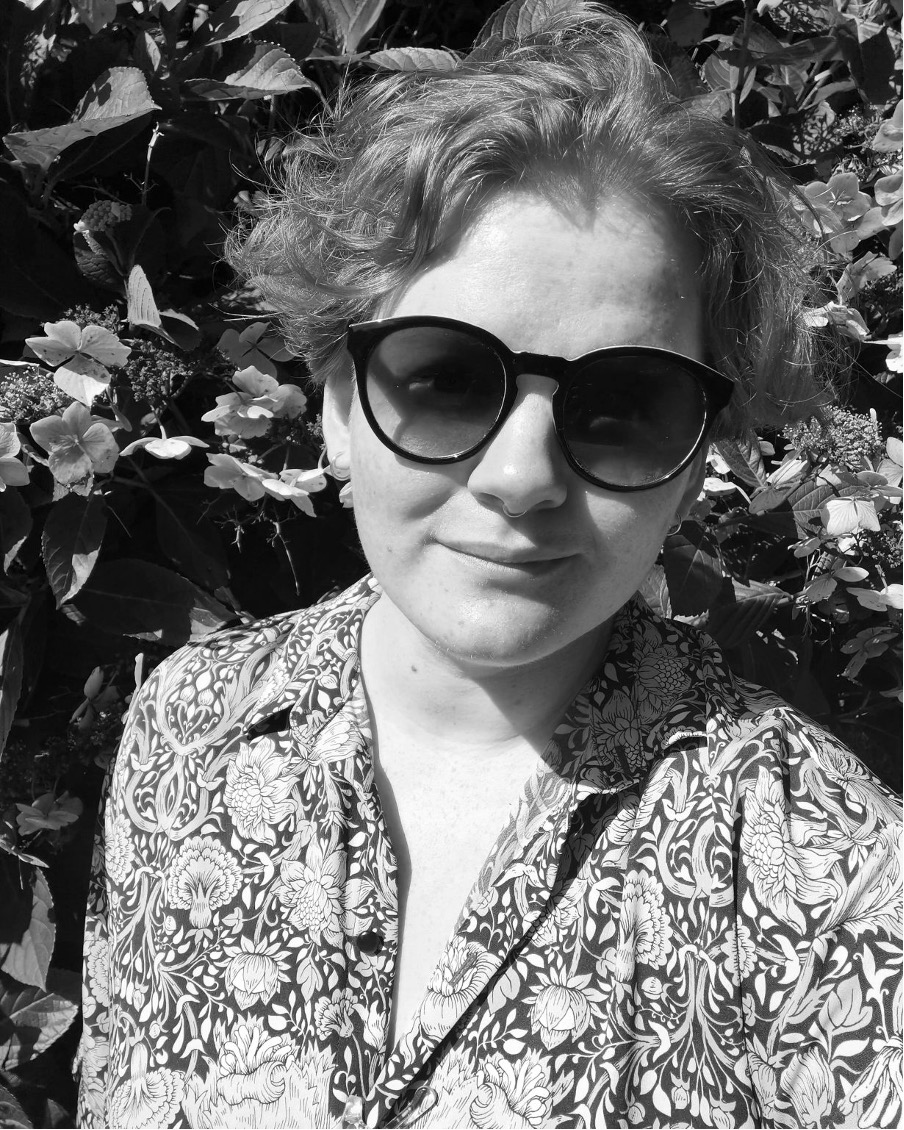 Black and white headshot of Rowan