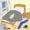 Webcomic showing a double bed in a room with a hot water bottle on top and clothes on the floor.