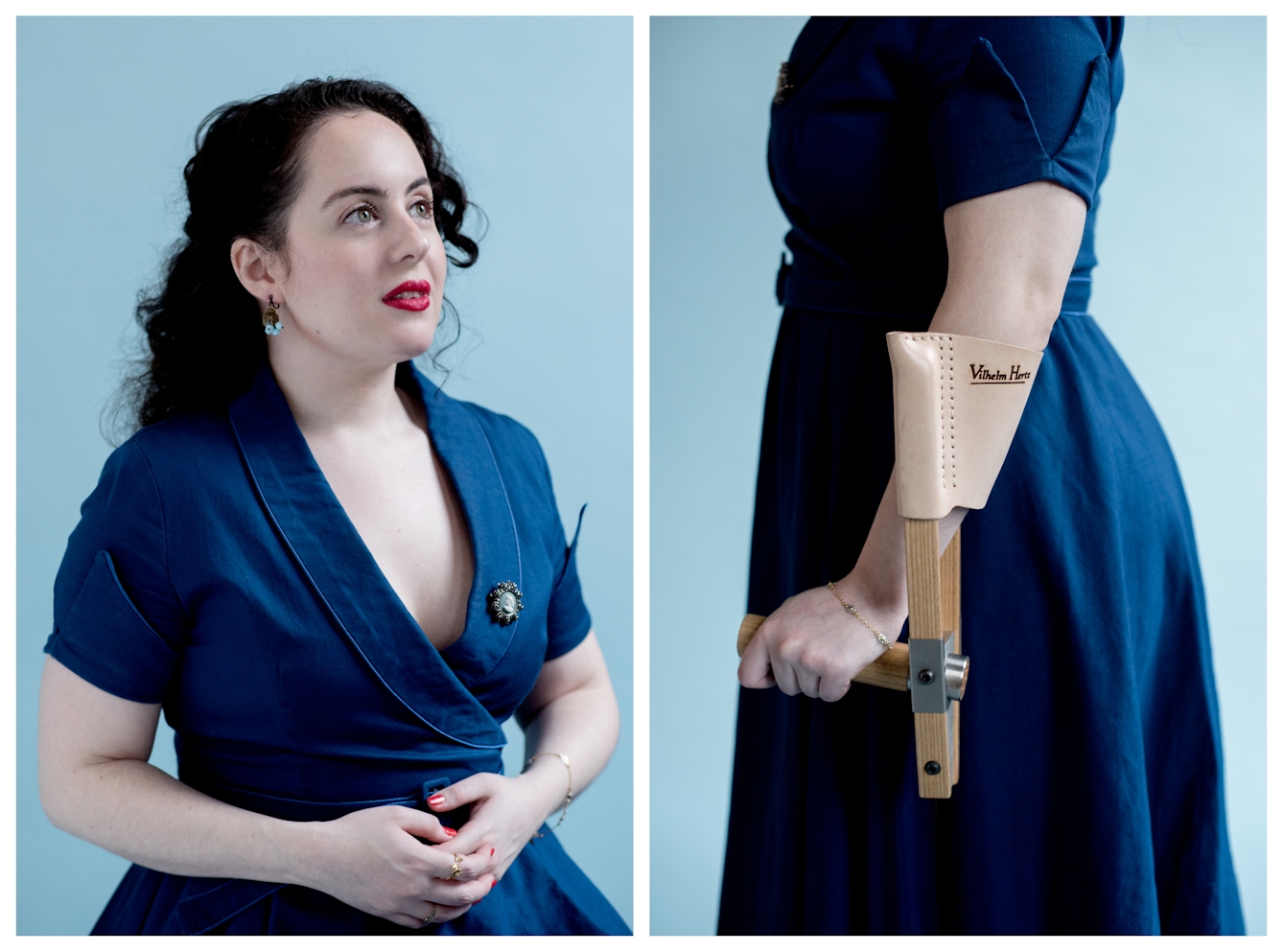 Photographic diptych. The image on the left shows a young woman in a blue dress and a broach against a light blue background looking up and to the right of camera. Her hands are clasped loosely across her front. The image on the right shows a young woman in a blue dress against a light blue background, standing side-on, from the shoulders to the mid thigh. Her left arm is holding a designer crutch with the brand name, Vilhelm Hertz written on the elbow brace.