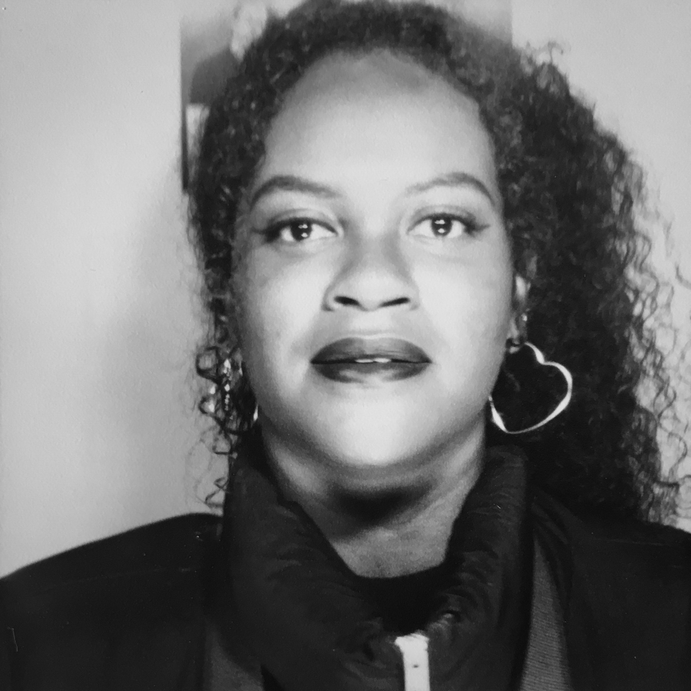 Black and white, head and shoulders portrait of Naomi Williams.