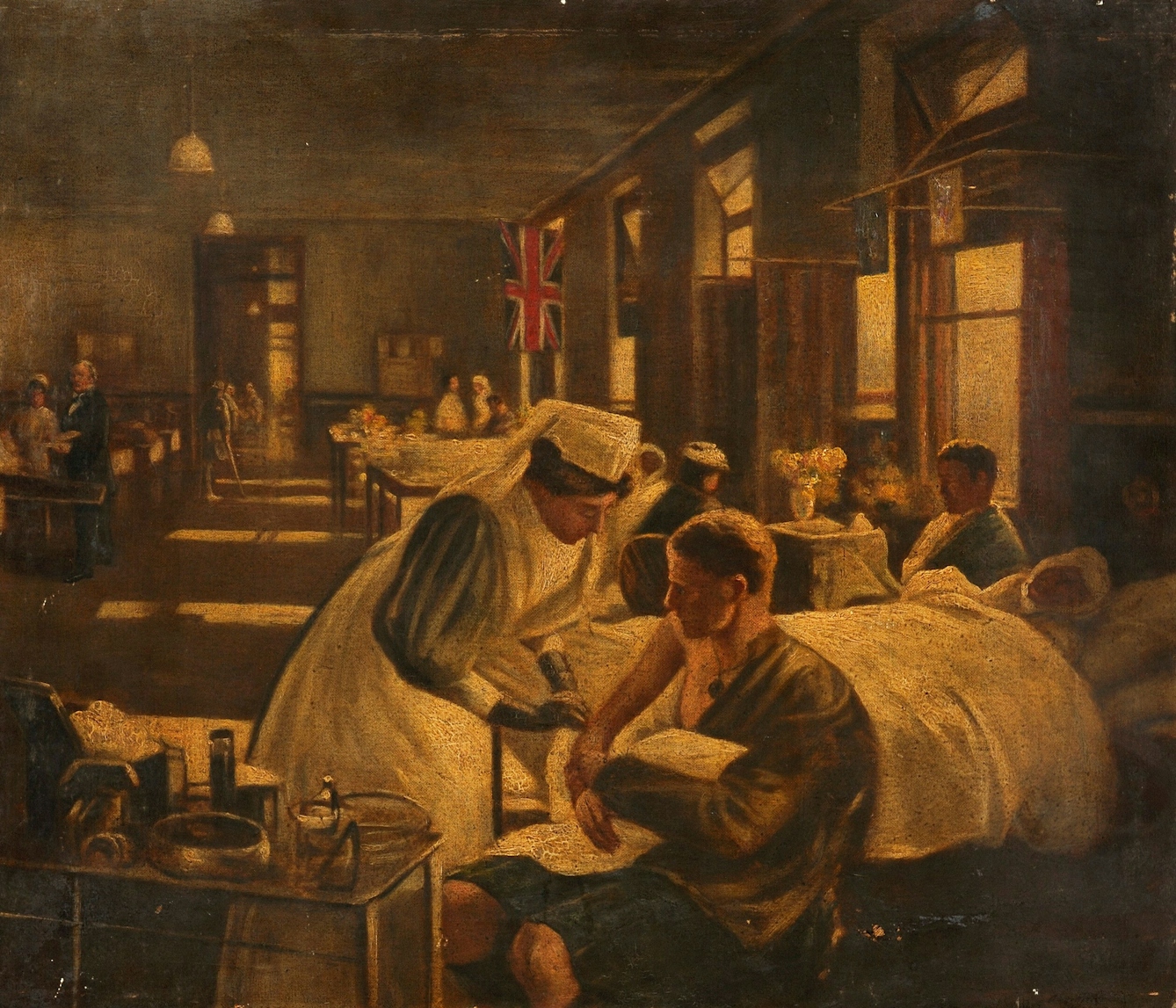 Colour painting of a hospital ward. A nurse tends to the arm of a seated man in the foreground. A large Union Jack flag hangs in the background.