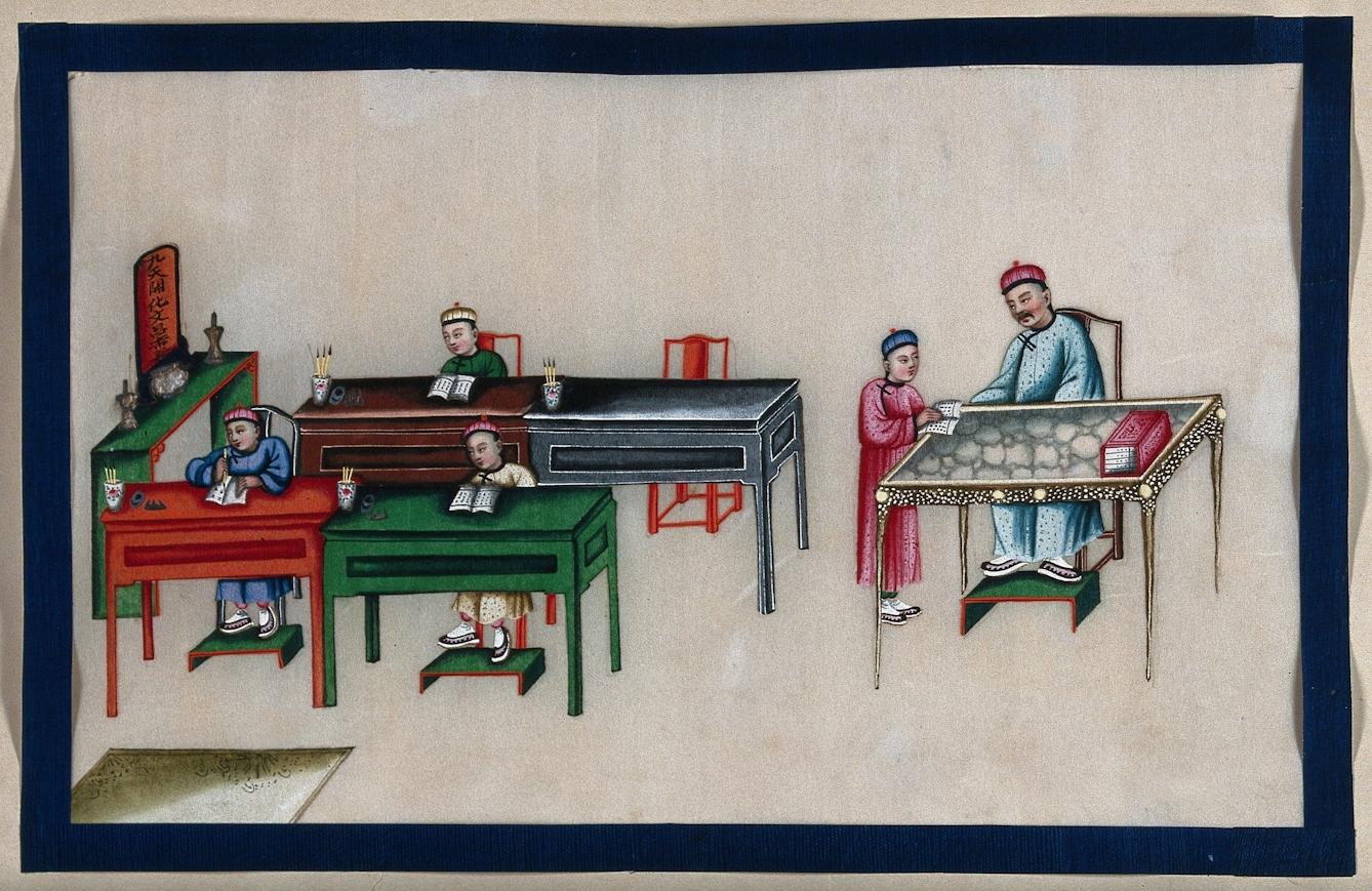 Painting of a classroom showing three students at their desks with books in front of them, and one student holding their book speaking to the teacher at their desk.