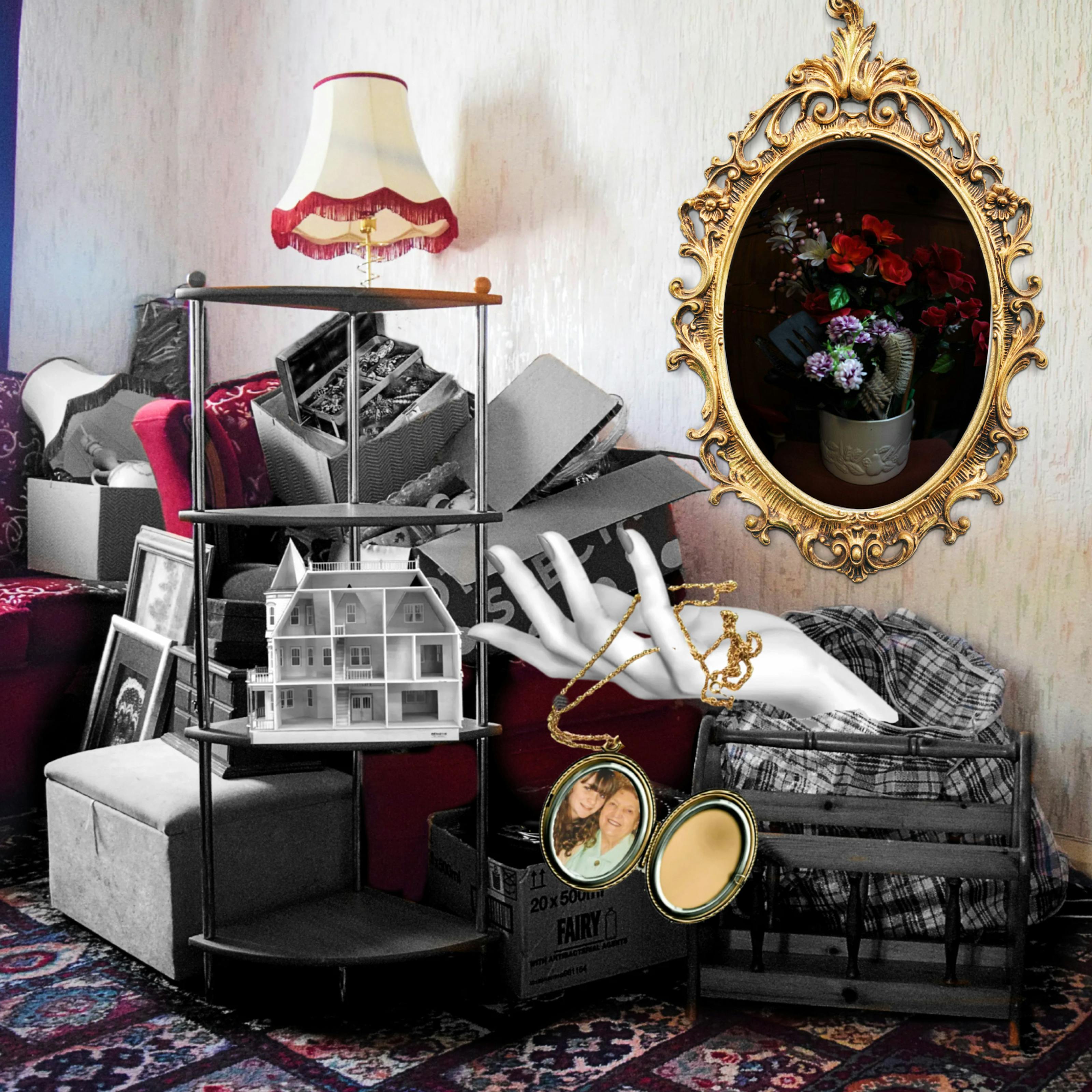 Colourful photograph with some coloured and black and white collage elements. The photo is of an empty living room with patterned off-white wallpaper, a red floral patterned sofa and a patterned carpet. There are pieces of black and white furniture in a pile next to and on top of the red sofa, including lamps, picture frames, storage bags, jewellery boxes and a shelving unit. On the shelving unit is a three story dollhouse which is empty. A black and white mannequin hand is shown coming out of a storage bag, and laced between its fingers is a golden pendant which is open and contains a photo of a girl and her grandma. On the wall is a ornate golden photo frame that contains a photo of a vase of different coloured flowers and a hairbrush. 