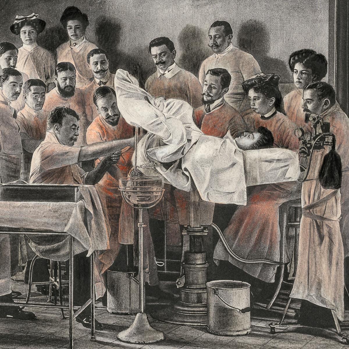 Pencil artwork drawn over an engraving of a photograph from the early 1900s which depicts a vaginal hysterectomy. The patient is lying on an operating table, her legs stirrups, covered in a white cloth. She is surrounded by 19 people who are either involved in the operation or just observing. The group is made up of mainly men. The whole scene is black and white apart from the gowns of the surgeons and observers which are tinted red.